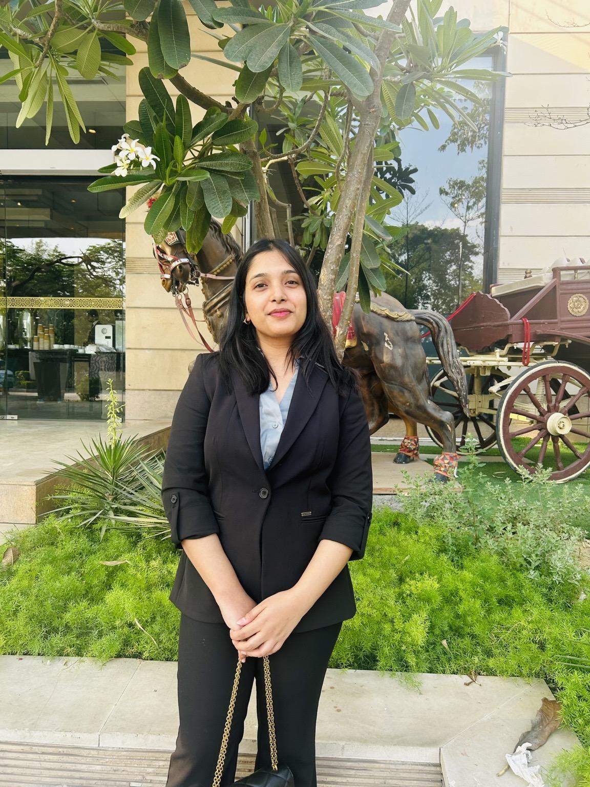 Harshita Arya in a professional black blazer